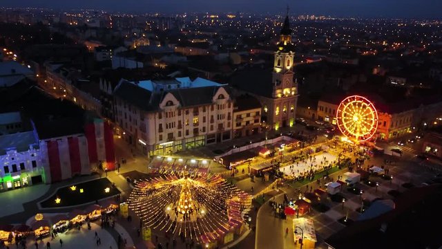 Amazing drone areal view of the city of Oradea, Romania. It showcases the Christmas market in the old town of Oradea.