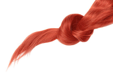 Knot of red hair on white background