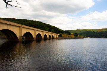 Fototapeta na wymiar From below the bridge crossing ladybower reservoir