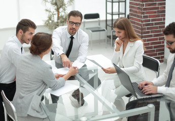 business team discussing business documents