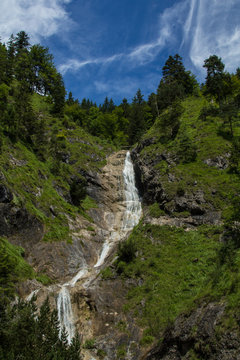 Waterfall in a mountain valley near Reit-im-Winkl in the Bavarian Alps in Germany