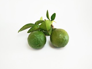 a kaffir lime with leaves