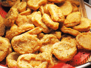 Close up of fried chicken nuggets on a buffet table
