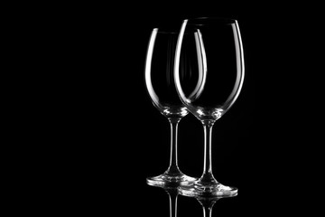 transparent wine glass on the black