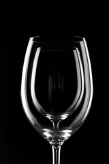 transparent wine glass on the black
