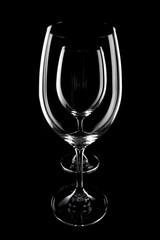 transparent wine glass on the black
