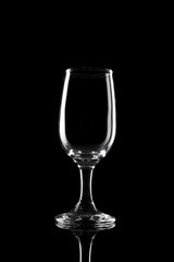 transparent wine glass on the black