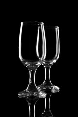 transparent wine glass on the black