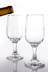 wine bottle with glasses  isolated white.