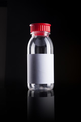 empty bottle isolated black.