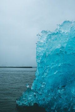 Iceberg in dark waters in Alaska