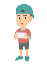 Little caucasian boy using a tablet computer. Smiling boy holding digital tablet in hands. Happy boy playing with digital tablet. Vector sketch cartoon illustration isolated on white background.