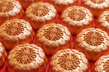 Moon cake on the red background,Asian traditional festival, Mid-Autumn festival.Chinese traditional festival.