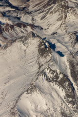 Fototapeta premium Aerial view of snow covered Sierra Nevada in California