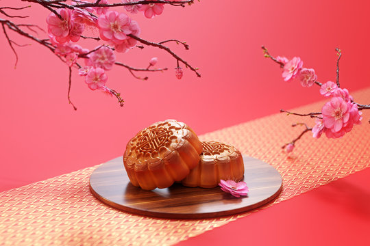 Moon Cake On The Red Background,Asian Traditional Festival, Mid-Autumn Festival.Chinese Traditional Festival.