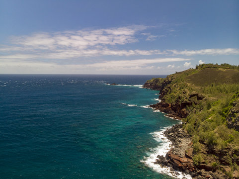 Waves Crashing on Rocks West Maui Coast Aerial