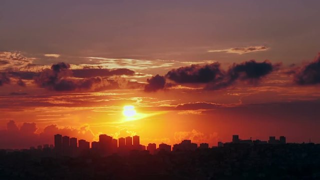 Time lapse sunset on the cloudy sky over city,  Turkey, Istanbul