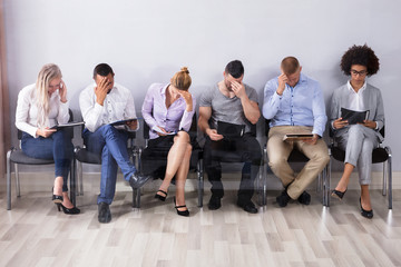 Bored People Waiting For Job Interview