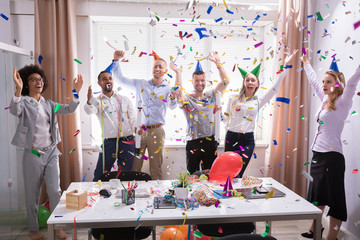 Excited Businesspeople Having Fun Raising Their Arms