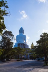 Phuket big Buddha in blue sky. locate of Phuket big Buddha viewpoint on the high mountain can see around Phuket island.stuning sunrise in Chalong gulf