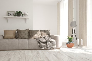 White room with sofa and winter landscape in window. Scandinavian interior design. 3D illustration