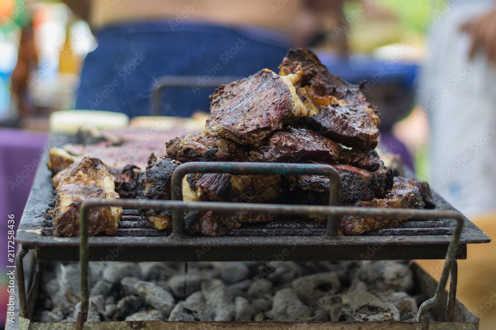 Wall mural grilled meat on the barbecue