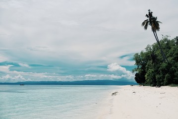 one of the white sand beaches of the tropical islands around Sabah, Borneo, Malaysia