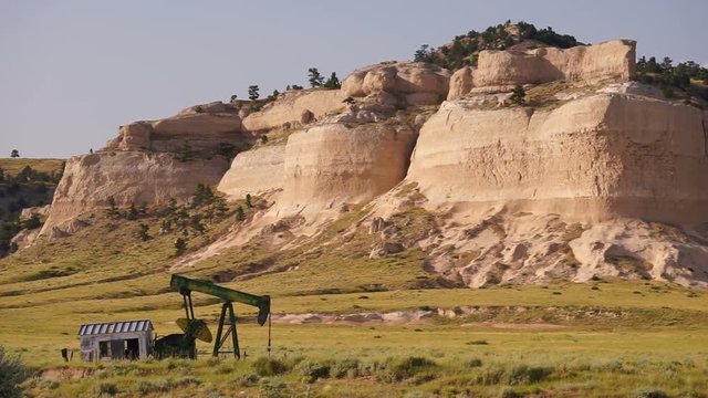 A Single Pump Jack Oil Fracking Platform Sits on the Wyoming Nebraska Border