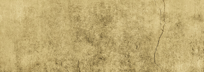 Textur einer goldenen Betonwand in XXL als Hintergrund,