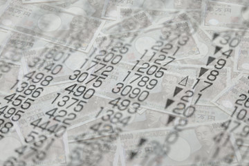 株価の数値と日本紙幣のバックグラウンド