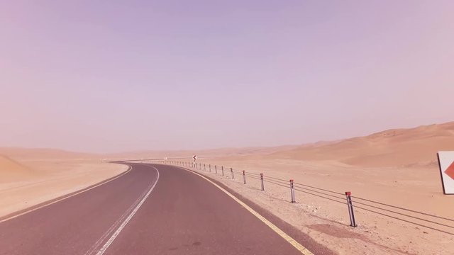 New road from Oasis Liwa to Moreeb Dune in Rub al Khali desert stock footage video