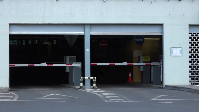 Crossing barriers at the parking garage exit and entrance