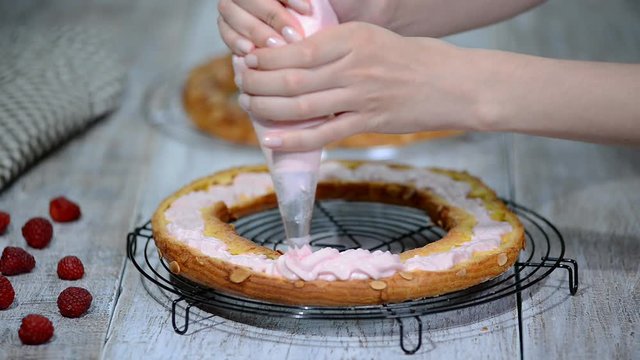 Preparation homemade choux pastry cake Paris Brest. French dessert.