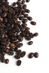 Roasted coffee beans isolated on pure white background for content using.