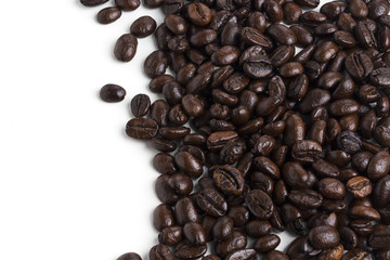 Roasted coffee beans isolated on pure white background for content using.