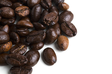 Roasted coffee beans isolated on pure white background for content using.