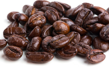 Roasted coffee beans isolated on pure white background for content using.
