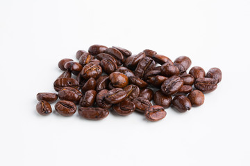 Roasted coffee beans isolated on pure white background for content using.