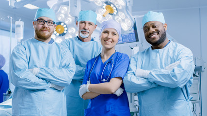 Diverse Team of Professional surgeon,  Assistants and Nurses Standing Proudly with Crossed Arms in...