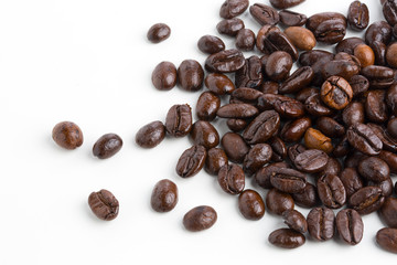 Roasted coffee beans isolated on pure white background for content using.