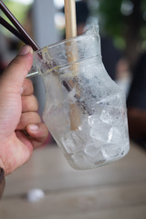 After finished drinking in hand