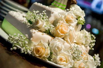 Beautiful wedding cake decorated with roses