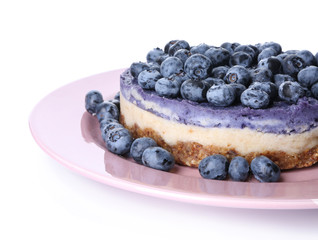 Plate with delicious blueberry cheesecake on white background, closeup