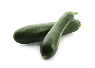 Fresh zucchinis on white background