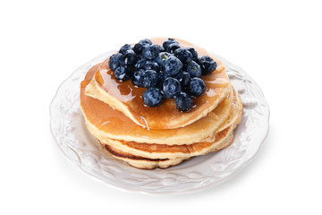 Plate with tasty pancakes and blueberries on white background