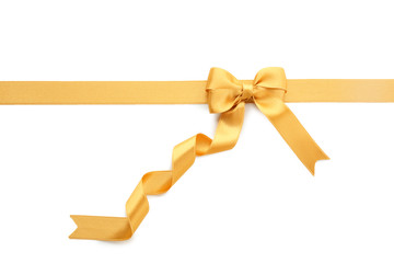 Fototapeta premium Golden ribbon with bow on white background