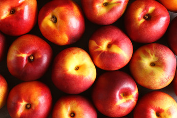 Fresh peaches as background