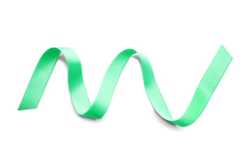 Green satin ribbon on white background