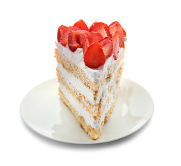 Plate with piece of delicious strawberry cake on white background