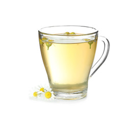 Glass cup of delicious camomile tea on white background